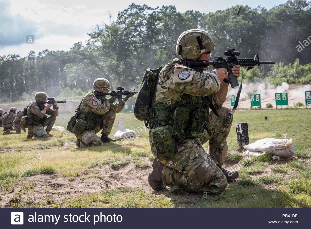 danish-home-guard-soldiers-at-the-shooting-range-with-american-weapons-camp-grayling-michigan-participating-in-northern-strike-PR41DE