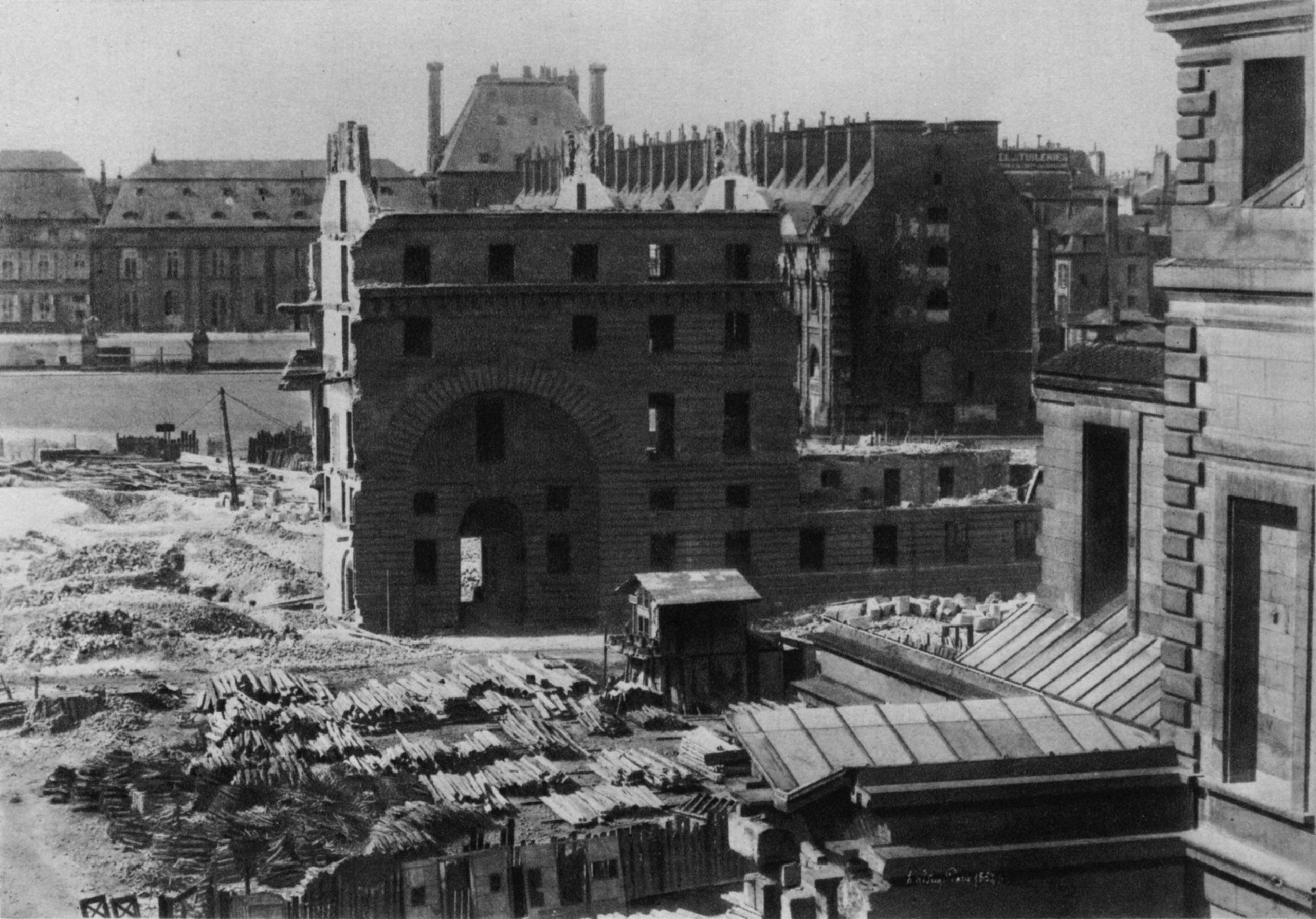 Demolition_of_houses_for_the_Place_du_Carrousel_in_1852_–_Christ_1949_Fig134